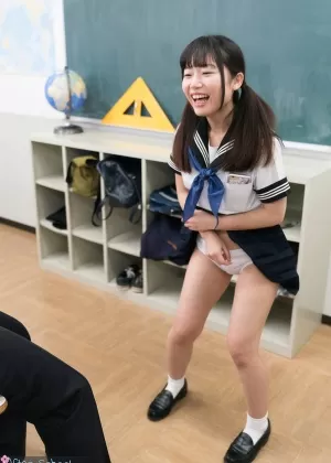 Cute Japanese schoolgirl lifts her skirt to masturbate for teacher in class