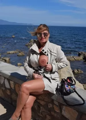 Shameless MILF Nude Chrissy flashes her big knockers and pussy in public