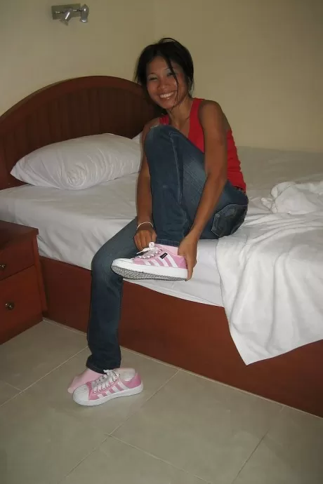 Cute asian teen babe stripping and exposing her big tits and hot ass