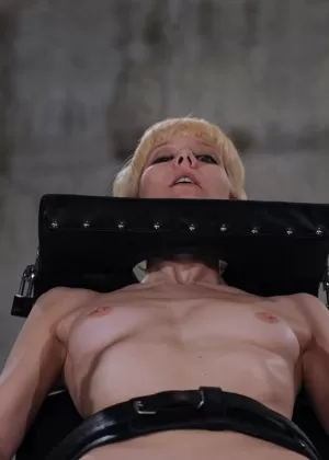 Redhead female tortures a blonde lesbian with hot wax play