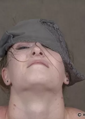 Restrained female Ashley Lane endures having her face submerged in water