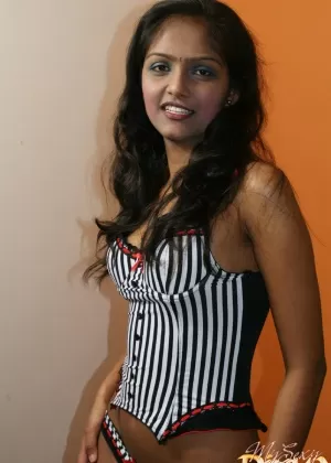 Indian solo girl looses her perky tits from sexy lingerie during solo action