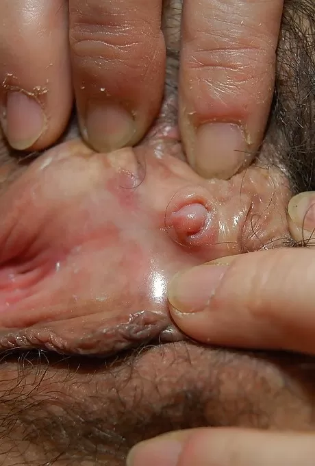 Oriental lady Tomoe Nakamachi plays with small boobs and masturbates