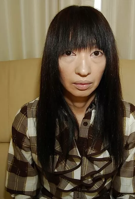 Ugly asian gal Yoshiko Nagasawa undressing and exposing her shaggy twat