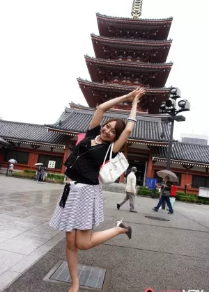 Pretty Japanese chick Ryo Akanishi shows some leg and cleavage while in public