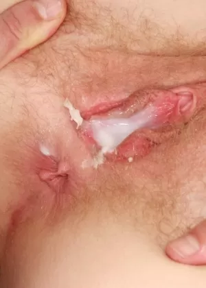 Hot MILF George sports a jizz filled pussy after anal fucking on a bed