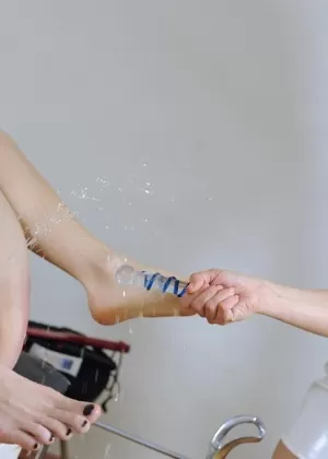 Blonde nurse toys a straightjacketed female patients asshole