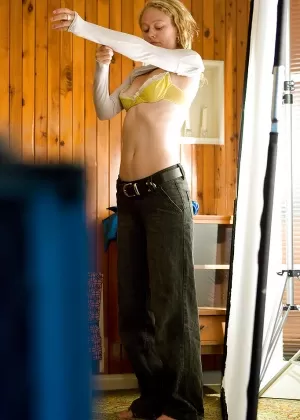 A perverted peeking Tom watches young amateur Sue getting dressed