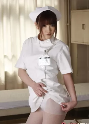 Horny Asian nurses strip their uniforms off and pose in sexy lingerie