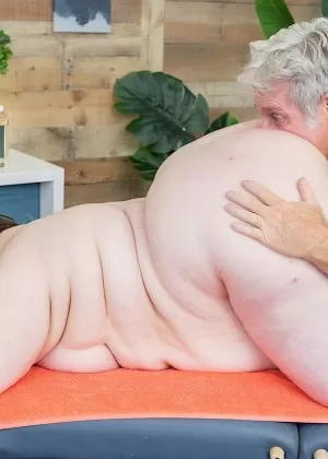 SSBBW Lacie Smith engages in oral sex acts with her older masseur