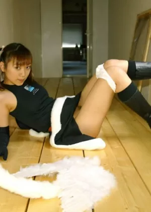 Seductive asian cheerleader uncovering her tiny tits and hairy cunt